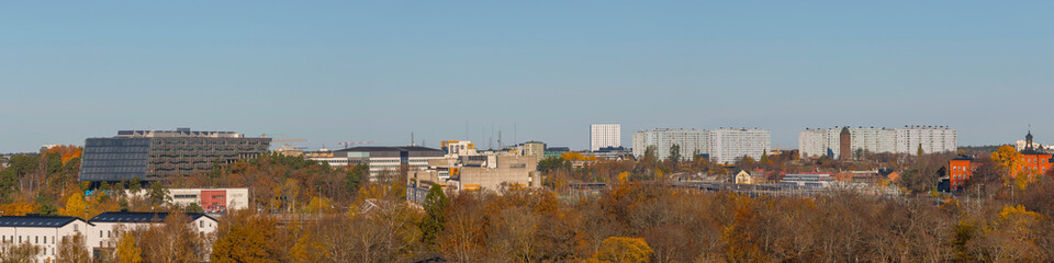 Fototapeta na wymiar Panorama with skyline of apartment and office houses in the district Solna a sunny autumn day in Stockholm