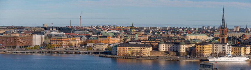 Panorama view from the mountain Skinnarviksberget, down town buildings, the island Riddarholmen,...