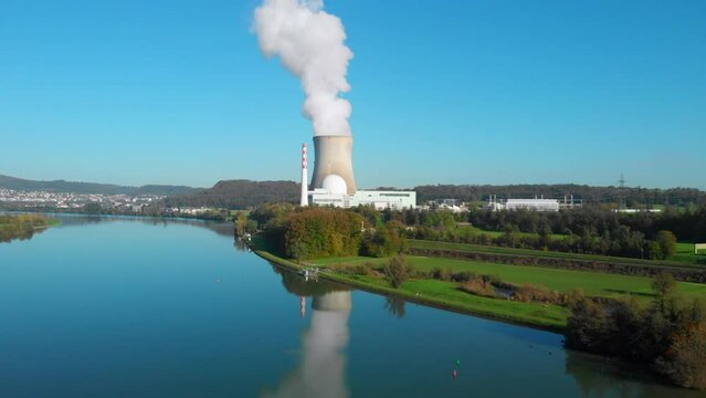 Nuclear power plant Leibstadt approached from the water in 4k