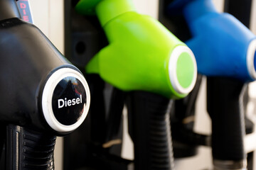 Diesel and petrol pumps on a gas station. Fuel nozzles oil dispensers. Petrol gas diesel fuel...