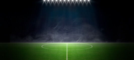 A sports stadium with a lights background, Textured soccer game field with spotlights fog - center,...