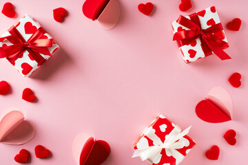 Valentines card wiht heart gift on pink background