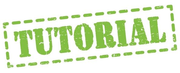 TUTORIAL text written on green stamp sign.