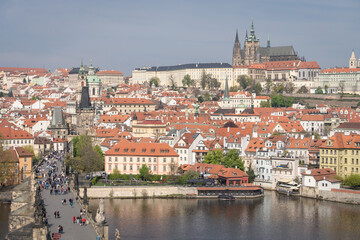 Naklejka na ściany i meble Historical old city panorama with dominant cathedral towering above downtown, Prague, Czechia