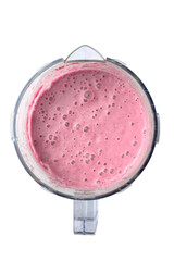 Summer strawberry or raspberry smoothie in blender jar, strawberry shake, detox drink, top view, isolated on white