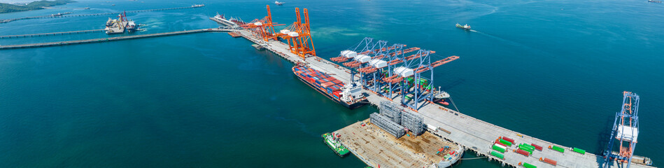 Cargo container Ship running to Bridge Cargo Shipyard Container ship under the crane Sea Port...
