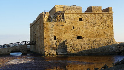 View of the Medieval castle at Paphos harbor in Cyprus. A famous travel destination landmark. The old fort.