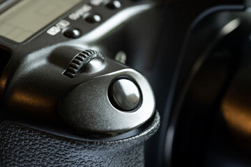 Simple generic photo camera shutter release button, object detail, macro, extreme closeup, nobody. Photography equipment symbol, photographing abstract concept, nobody, no people, part of a camera
