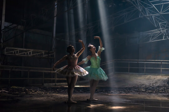 Two Young Ballet Dancers Performed In Dark Place With Lights Shown From Above, Ballet Concept