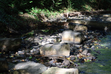 stoness in a stream in summer