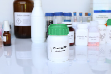 Vitamin PP pills in a bottle, food supplement for health