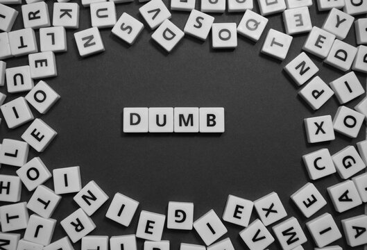 Letters spelling out dumb