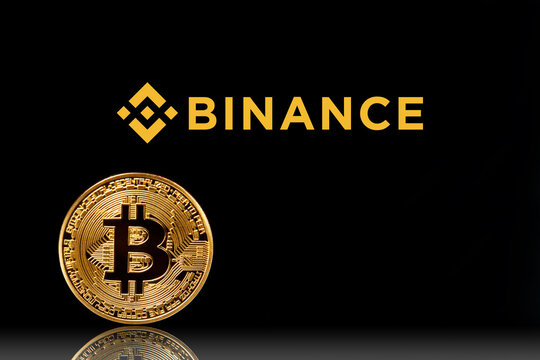 Binance logo with bitcoin on black background. Binance - one of the largest cryptocurrency exchange on the market. Moscow, Russia - November 1, 2022.