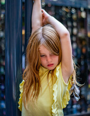 Beautiful blonde girl dances