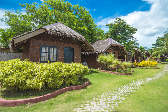 Dumaluan Beach, Panglao Island, Bohol, Philippines - Oct 2022: Quaint rustic bungalows in Dubay Beach Resort.