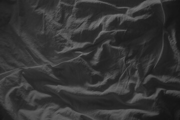 Crumpled bed background, black and white background.