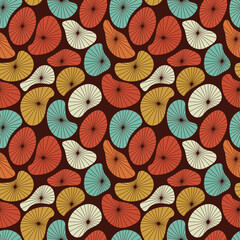 Fototapeta na wymiar Groovy seamless pattern. Seamless abstract pattern in vintage 70s style in orange and brown for a fabric or paper print.