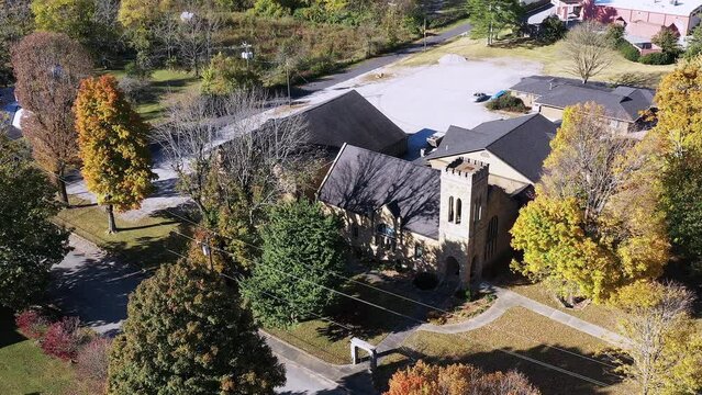 Southern American country church in Monteagle, Tennessee fall season. Aerial view with autumn colors.