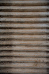 Obraz premium Old washboard by hand that was formerly used in homes. Vertical wood stripes backdrop