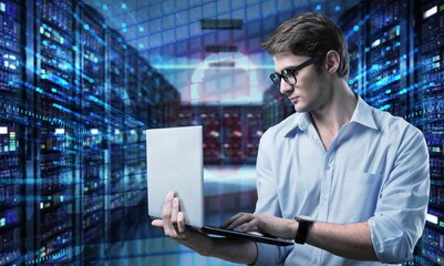 Futuristic Data Center and man Holding Laptop,