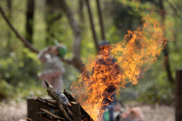 flames with kids in the back