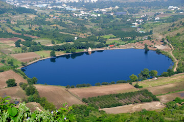 Fototapeta na wymiar Scenic view of Mastani Talav or Lake From Dive Ghat, situated near Wadki village, The water reservoir was built around 1720, Pune, Maharashtra, India.
