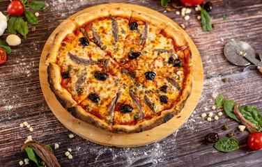 Pizza Napoli with olives and anchovies