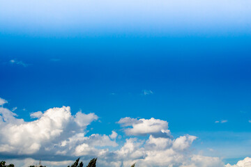 white clouds in the blue sky