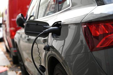 Fototapeta premium Charging cable for electric car