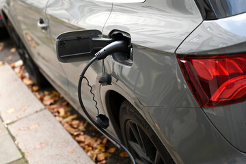 Fototapeta premium Charging cable for electric car