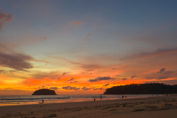 Fototapeta premium aerial view sweet sky in sunset above the ocean at Kata beach Phuket. .abstract nature background..Sunset with sweet color light rays and other atmospheric effects.