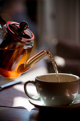 cup of tea with teapot