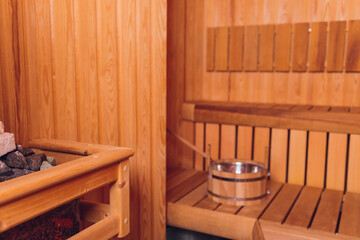Fototapeta na wymiar Sauna interior - Relax in a hot sauna.