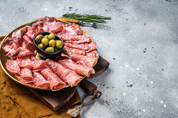 Cured meat platter of traditional Italian appetizers with Prosciutto crudo, Salami and Coppa...