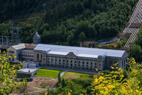 Aerial shot of the Vemork power station with the surrounding forest in Rjukan, Norway