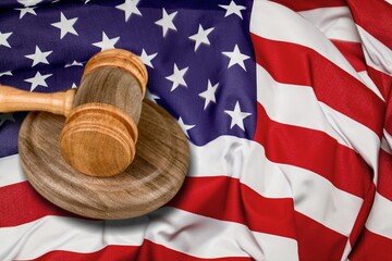 Classic USA flag and judge wooden gavel