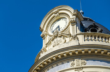 Clock on the top of a building in Toulouse, France