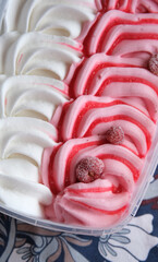 industrial ice cream with strawberry and cream flavor - closeup