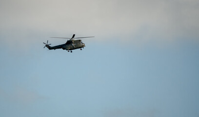 Helicopter on a training exercise, autumn sky, Wiltshire UK