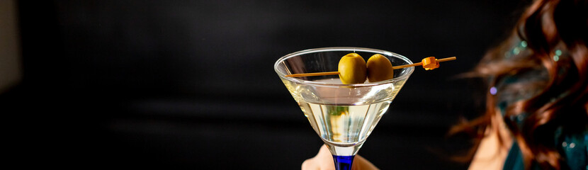 tasty Martini with olive. Classic Shaken Dry Vodka Martini. Space for text. Alcoholic cocktail with...