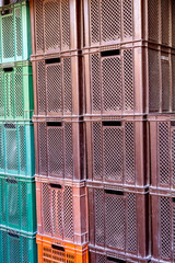 Close-up of a warehouse of empty plastic boxes.