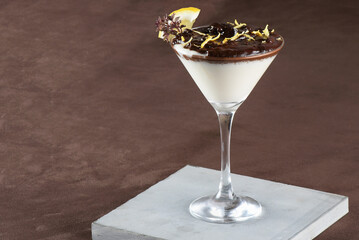 white sweet strawberry ganache with lemon zest served in a glass bowl.