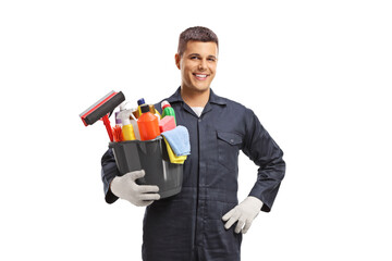 Male janitor holding a bucket with cleaning supplies