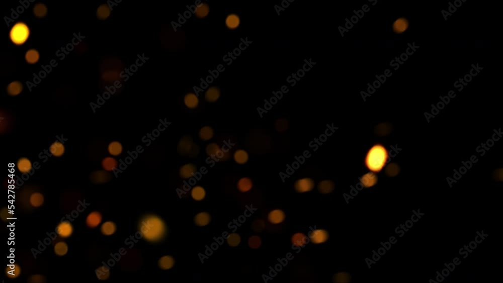 Poster loop abstract flow up glow orange bokeh rising up on black background. 4k 3d animation of fiery oran