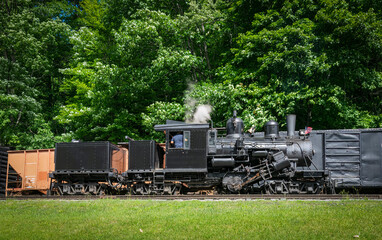 Cass, West Virginia, June 18, 2022 - A View of a Antique Shay Steam Engine Warming Up Blowing Steam...