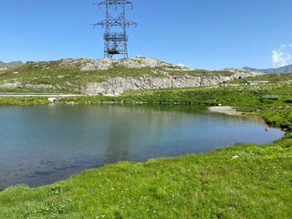 Summer atmosphere on the Lago dei Banchi or Lake Banchi in the Swiss alpine area of mountain St....