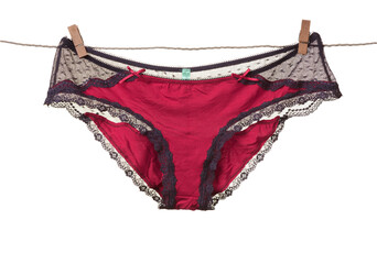 Women's panties hanging on rope 