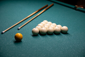 Billiard table. Balls and cue. Russian billiards.