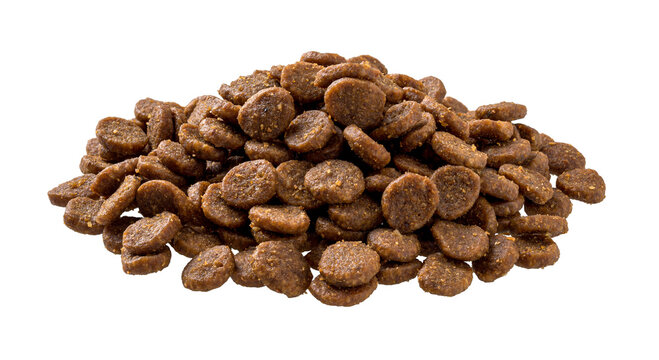 Pile of dry pet food cutout. Heap of grain free dry protein kibbles for cats isolated on a white background. Veterinary diet feed concept. Complete dry food for domestic animals.