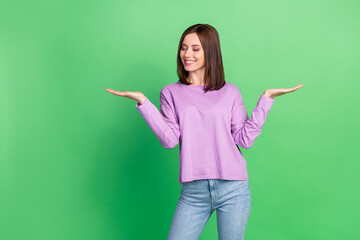 Photo of young gorgeous optimistic bob hairstyle young lady hold demonstrating object isolated on...